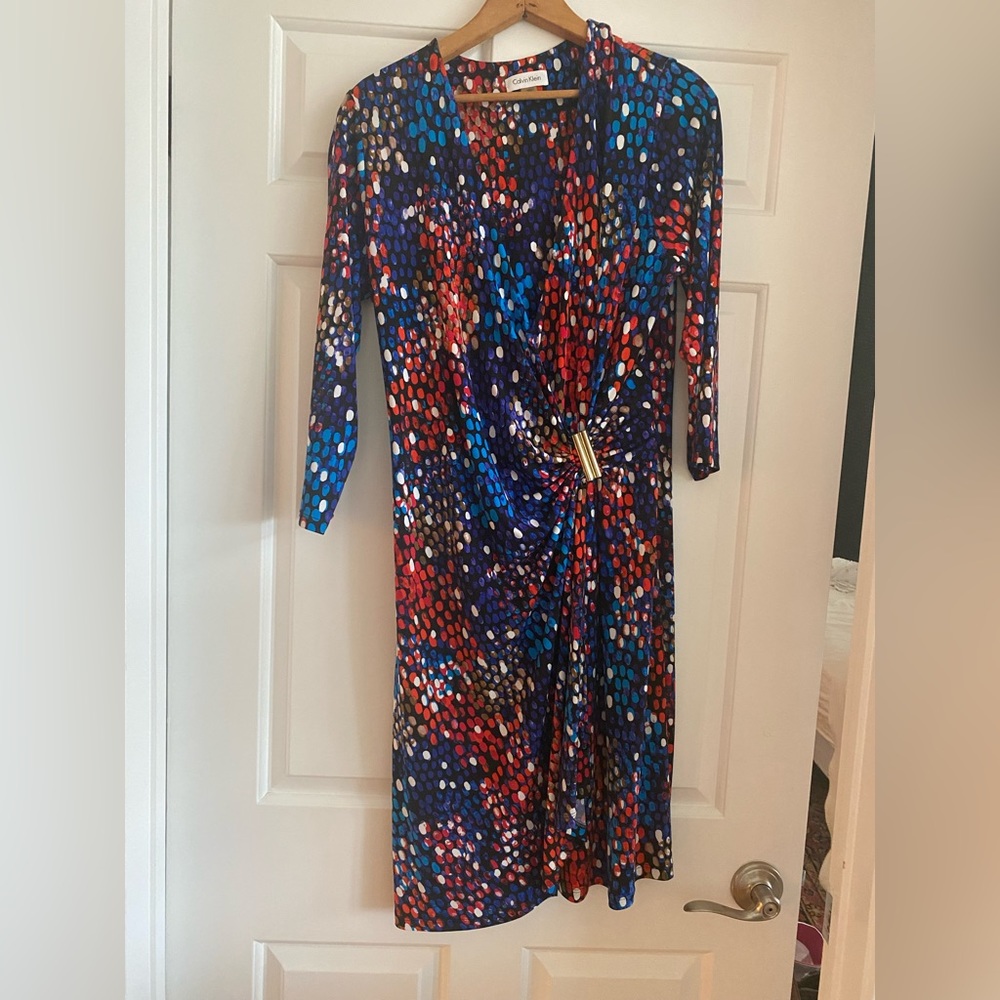 Calvin Klein wrap-style Dress red, blue, white pattern w Blk & Tan background